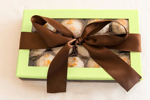 Load image into Gallery viewer, CITRUS/WHITE CHOCOLATE DIPPED MACAROONS
